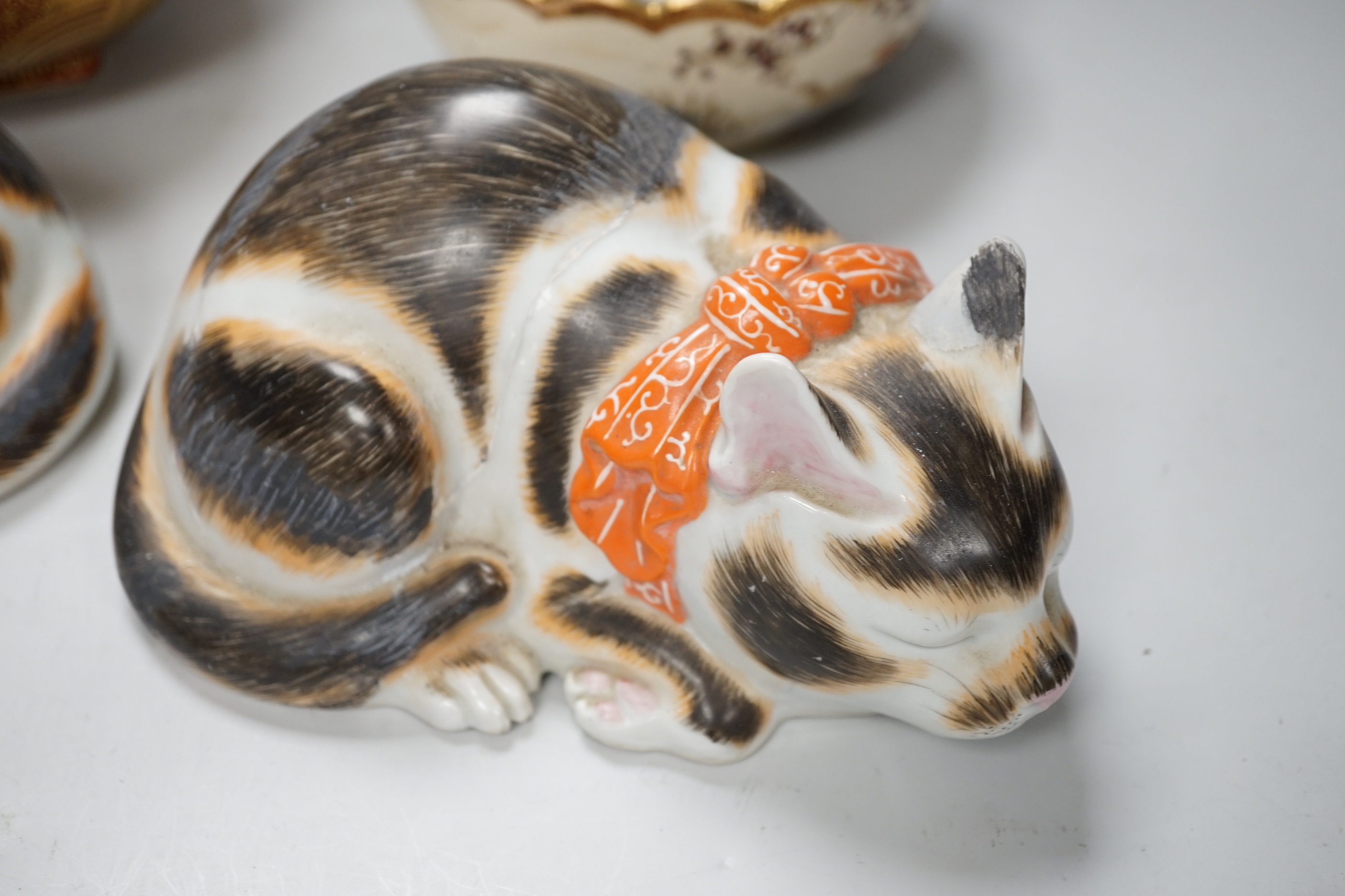 Japanese ceramics comprising pair of cats, satsuma bowl and a gilded example, the largest 17cm wide